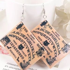 - $2 New spirit board dangle earrings $2 WITH ANY $10 OR MORE